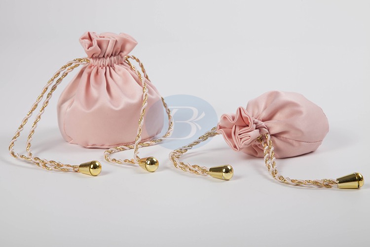 custom round bottom satin jewelry pouches