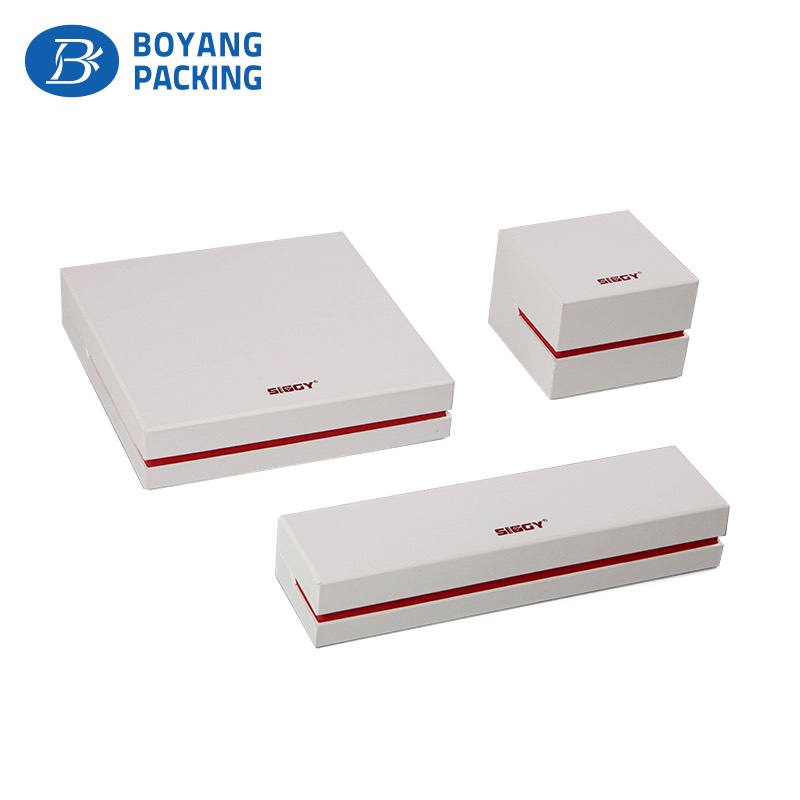 White custom paper jewelry box with velvet insert